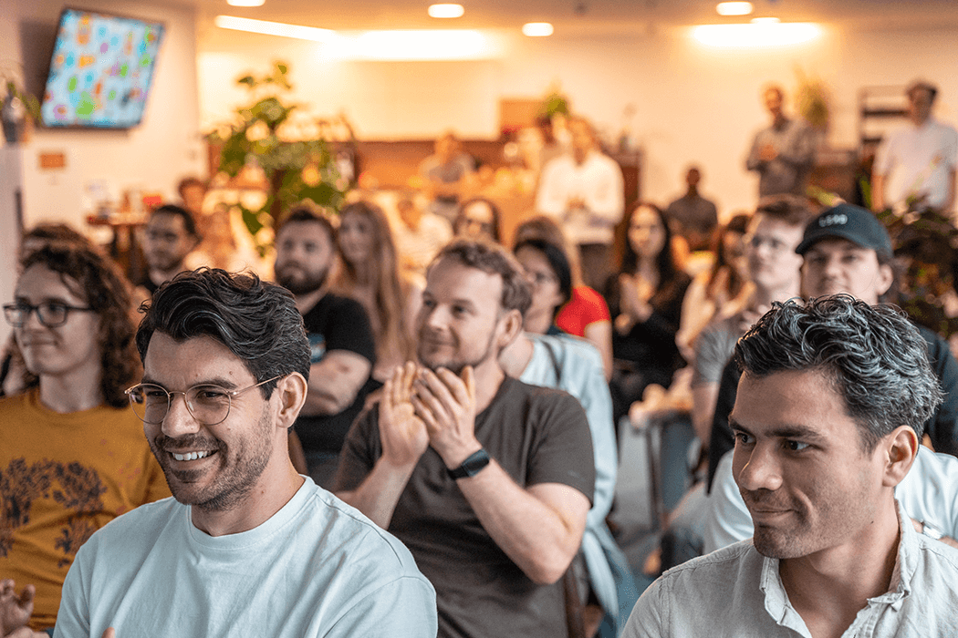 happy fiskaly employees clapping in the office Best Workplaces 2023 and Great Place to Work 2024 2025